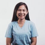 Asian woman portrait, laughing.